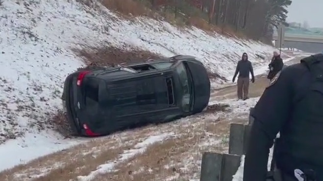 Car flips over on Hall County I-985
