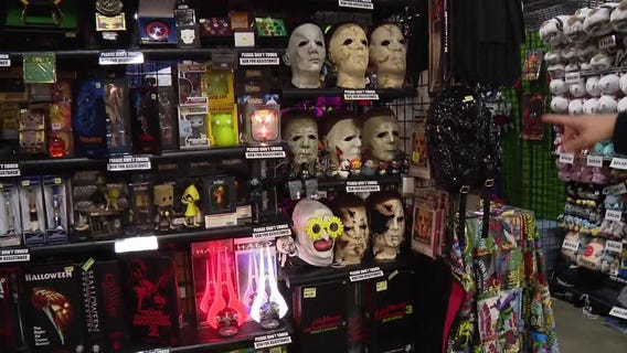 Jay Towers looks at vendor booths at Motor City Comic Con