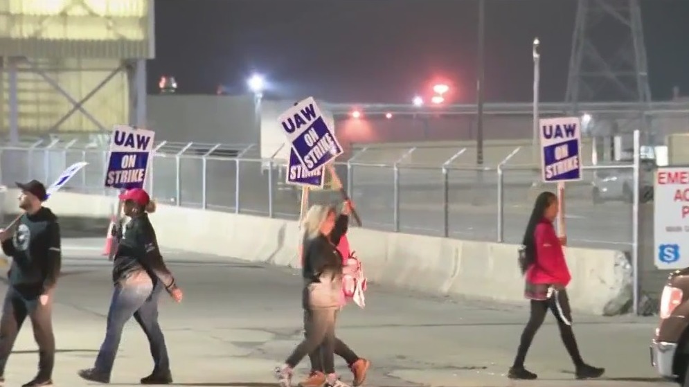 Automakers announce layoffs as UAW strike nears week mark