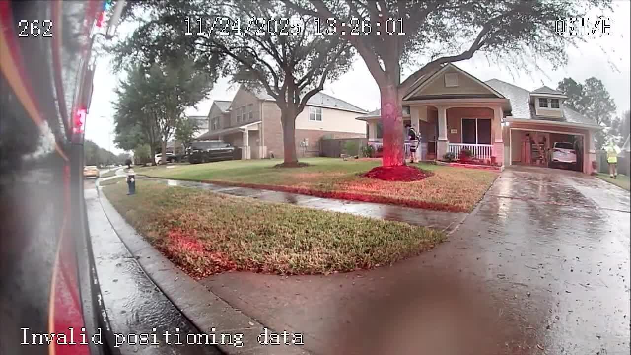VIDEO: Cy-Fair firefighters take shelter in resident's garage during high winds