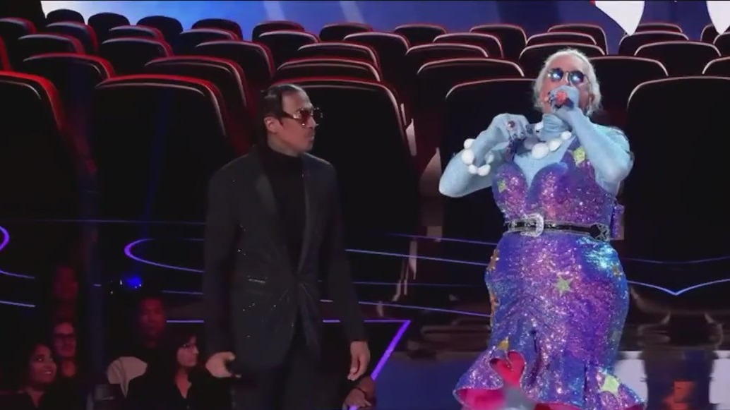 The Masked Singer reveals rock singer as 'The Doll'