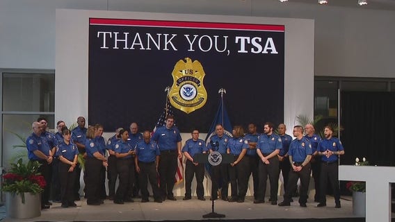 Kristi Noem presents $10K bonus checks for TSA officers at TPA