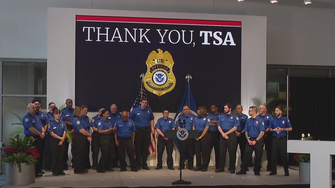 Kristi Noem presents $10K bonus checks for TSA officers at TPA
