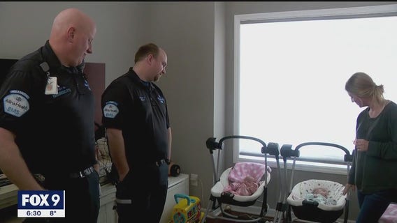 Allina EMS crew meets twin babies it helped deliver inside ambulance