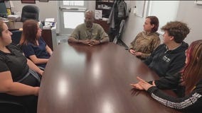 Volunteer helps students prepare for futures