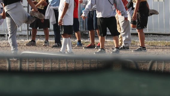 Trump administration argues detained migrant children may not necessarily need soap, toothbrushes