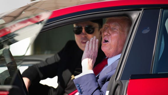 President Donald Trump buys new Tesla alongside Elon Musk