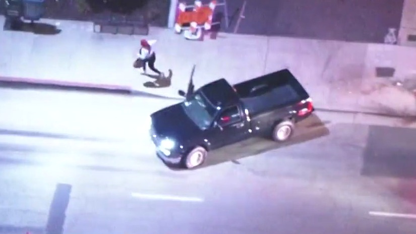 Woman crashes into construction sign mid-police chase