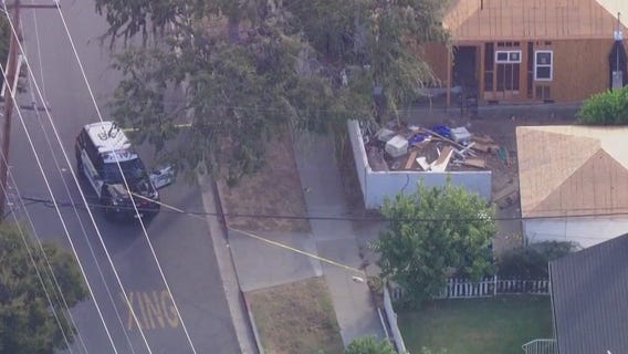 Man shot by police near school