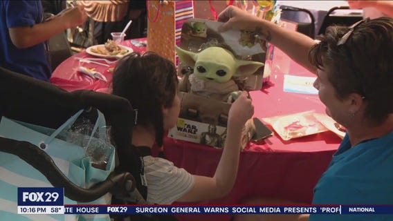 Toys for Tots throws birthday celebration for hundreds of foster children