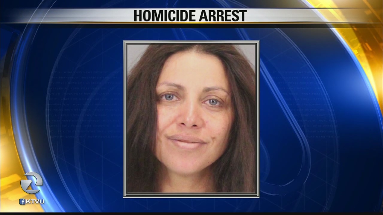 Woman arrested in slaying