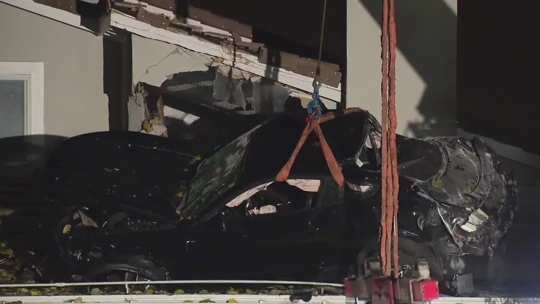 Ford Mustang lands on roof of Chino home