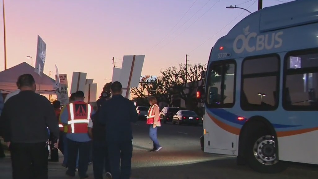 OC bus maintenance workers take to streets to strike