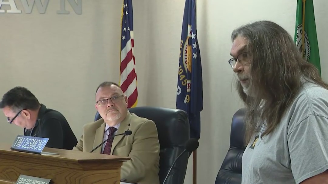 Oak Lawn police supporters, protesters butt heads during board meeting over violent arrest