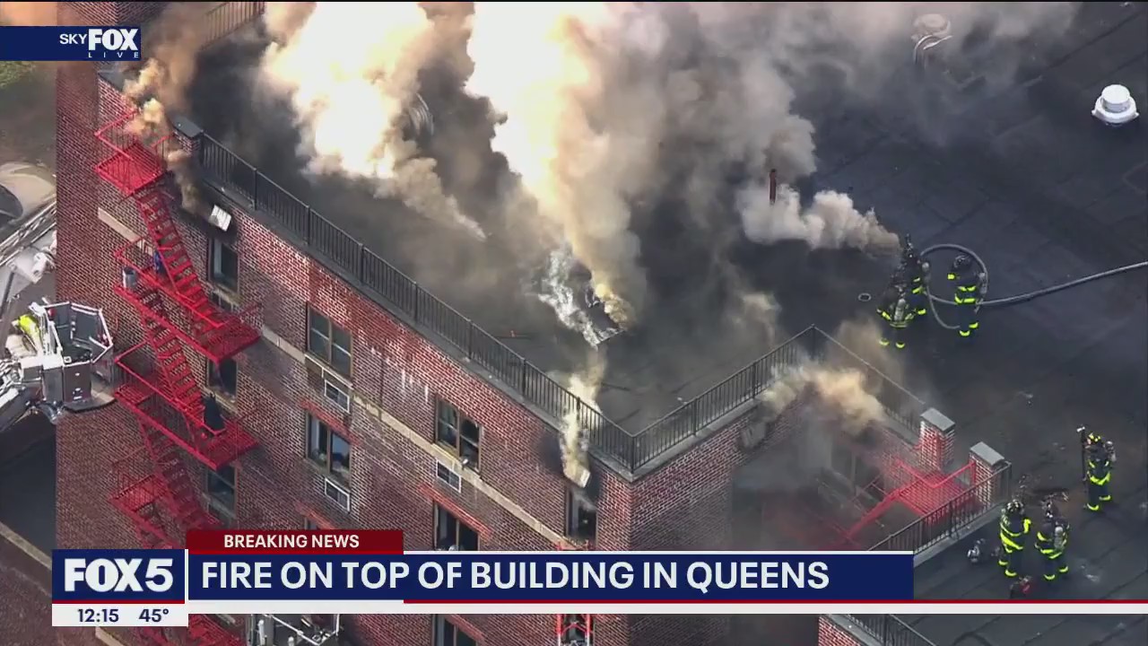 Fire on top of building in Queens