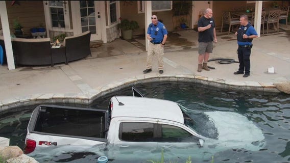 Truck lands in Menifee backyard pool