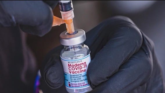 When could the new COVID-19 booster shot be available?