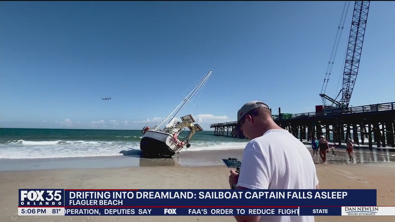 Boat stranded on Flagler Beach shore