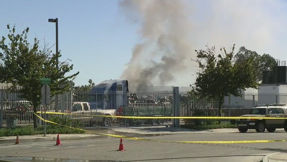 Salvage yard fire breaks out in Riverside amid high wind warning