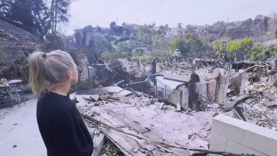 Fire survivor returns to what's left of home