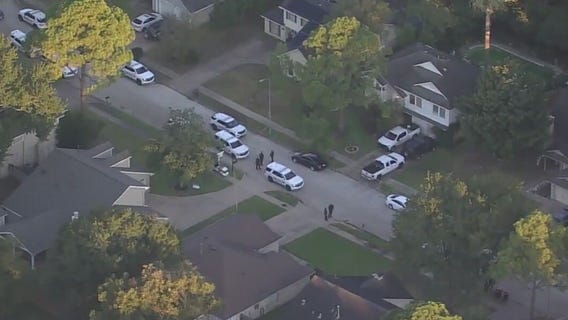 Man found fatally shot outside Katy home; one detained