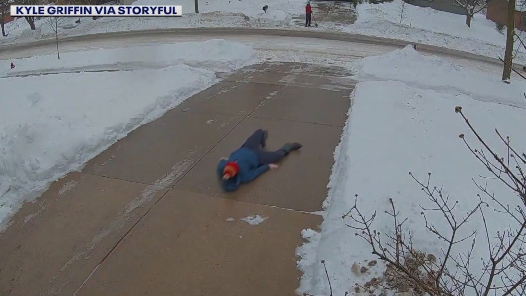 Dad slips on icy driveway