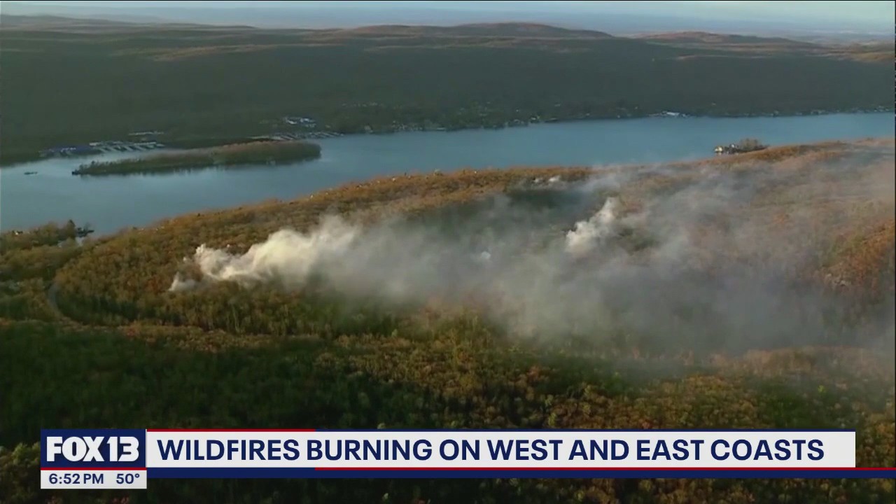 Wildfires continue to burn on East, West Coast