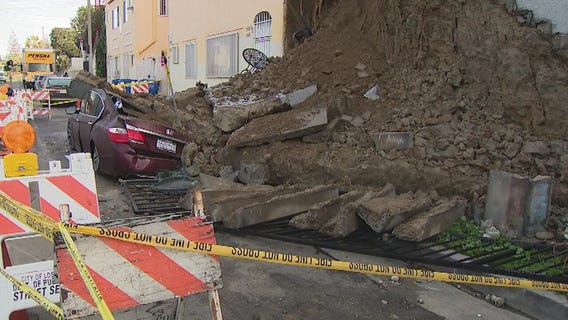 Wall collapses onto vehicle in Echo Park; gas line ruptured