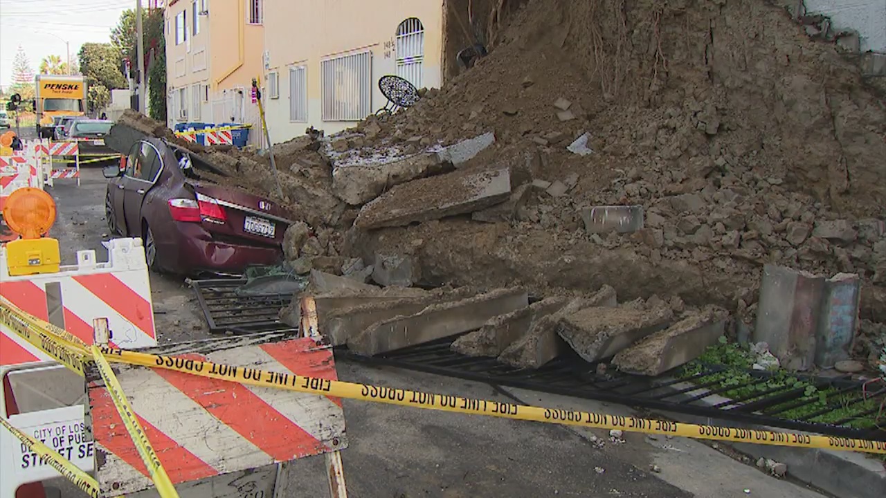 Wall collapses onto vehicle in Echo Park; gas line ruptured