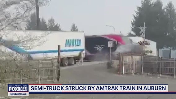 Semi-truck struck by Amtrak train in Auburn