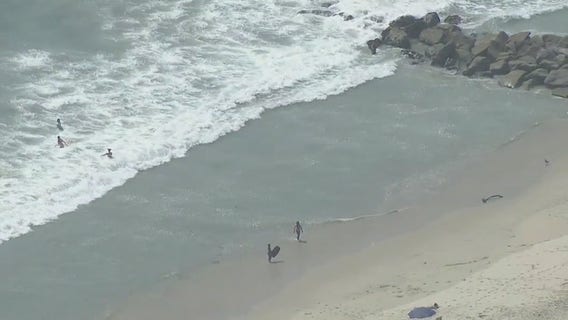 Beaches reopen after sewage spill
