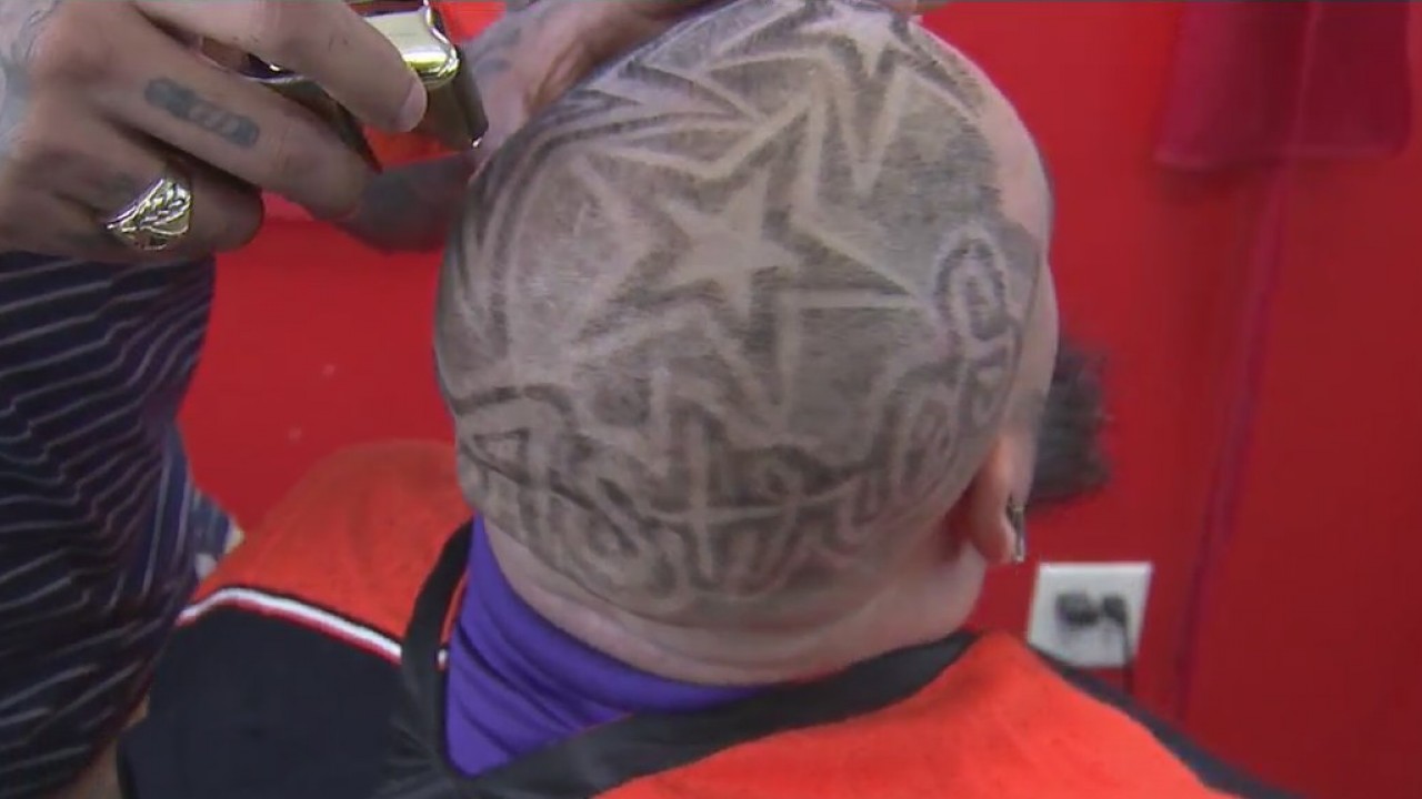 Astros fans get Astros-themed hair designs