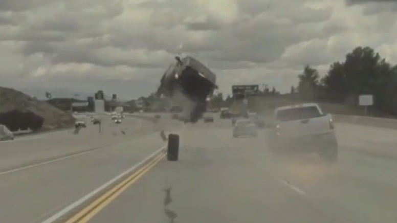 Car goes airborne, flips on Los Angeles freeway after hitting tire