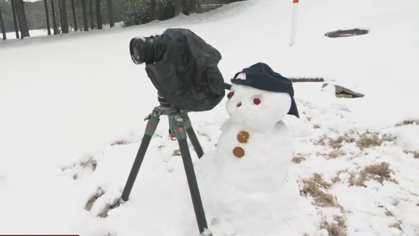 FOX 5 snow "camera" man