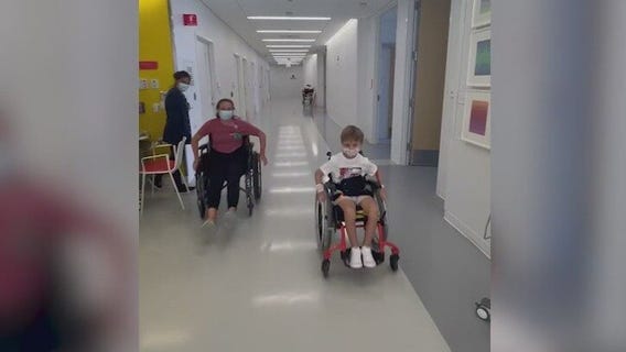 Highland Park shooting victim Cooper Roberts doing better, took part in wheelchair race