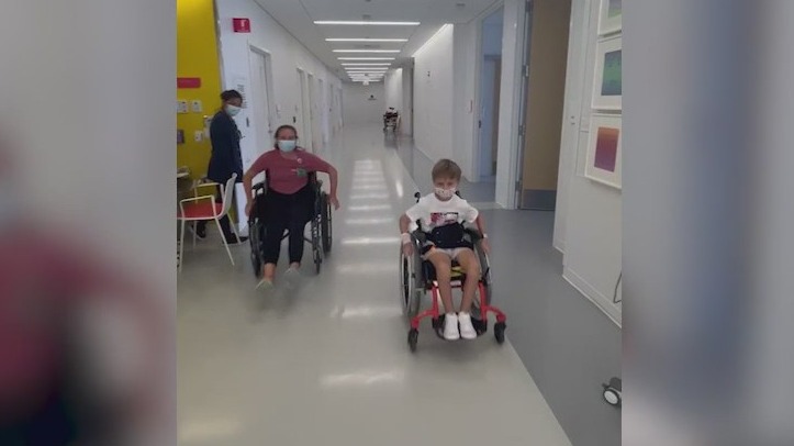 Highland Park shooting victim Cooper Roberts doing better, took part in wheelchair race