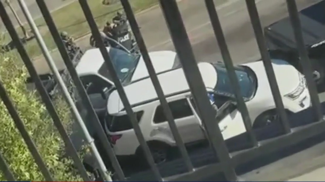 One person in custody after shooting with officers