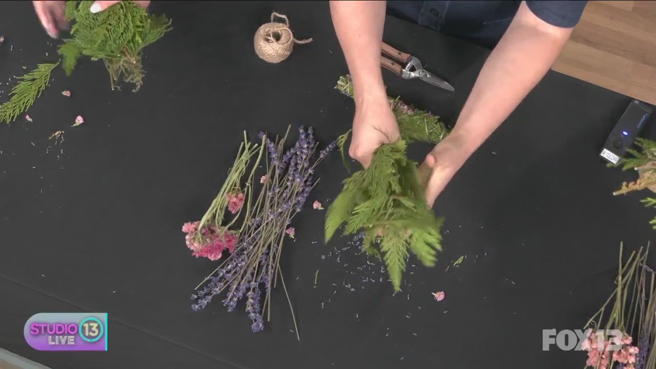 Making smudge sticks to clear negative energy