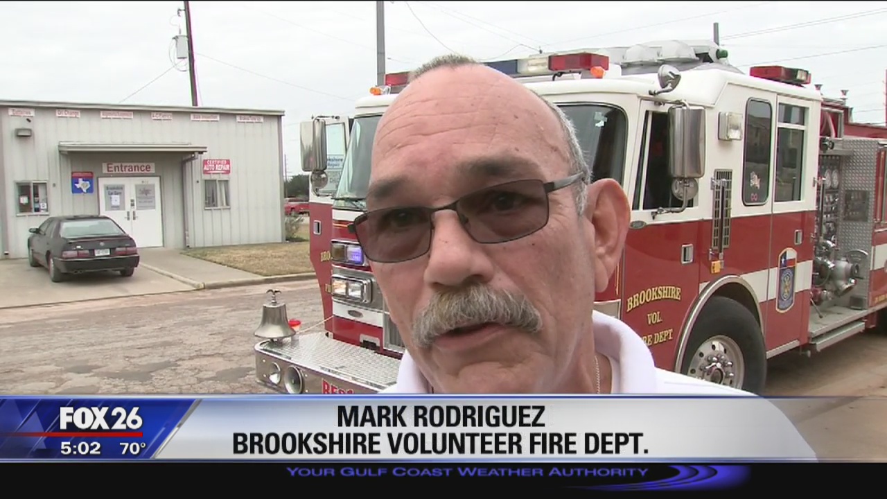 Volunteer firefighters deliver meals to families in need