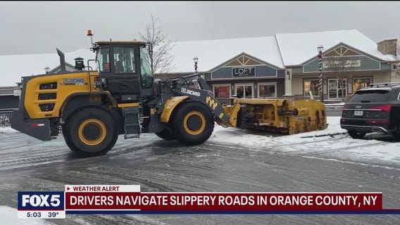 Drivers navigate slippery roads in Orange County