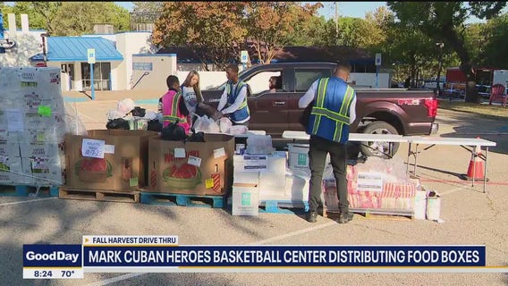 Mark Cuban Heroes Basketball Center distributing food
