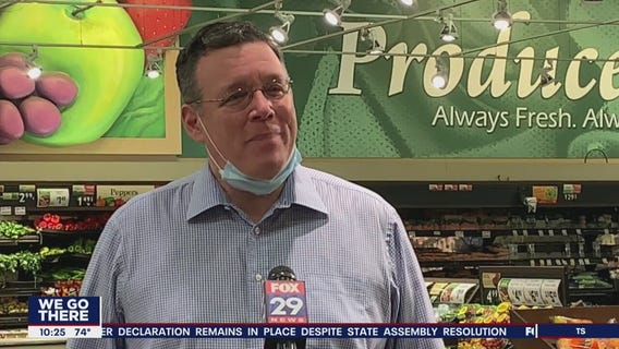 Local business owner helps others following looting, vandalism