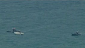 Search for missing swimmers in NW Indiana shifts to recovery mission; efforts to resume Sunday