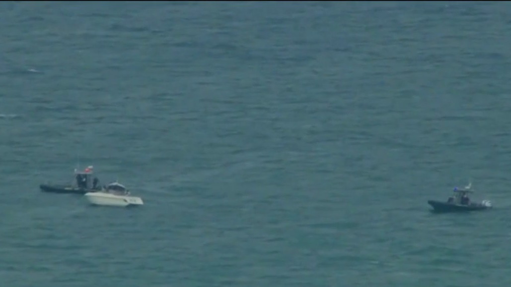 Search for missing swimmers in NW Indiana shifts to recovery mission; efforts to resume Sunday