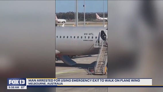 Australian man arrested for walking on plane wing
