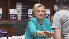 Hillary Clinton signs copies of her new book to large crowds