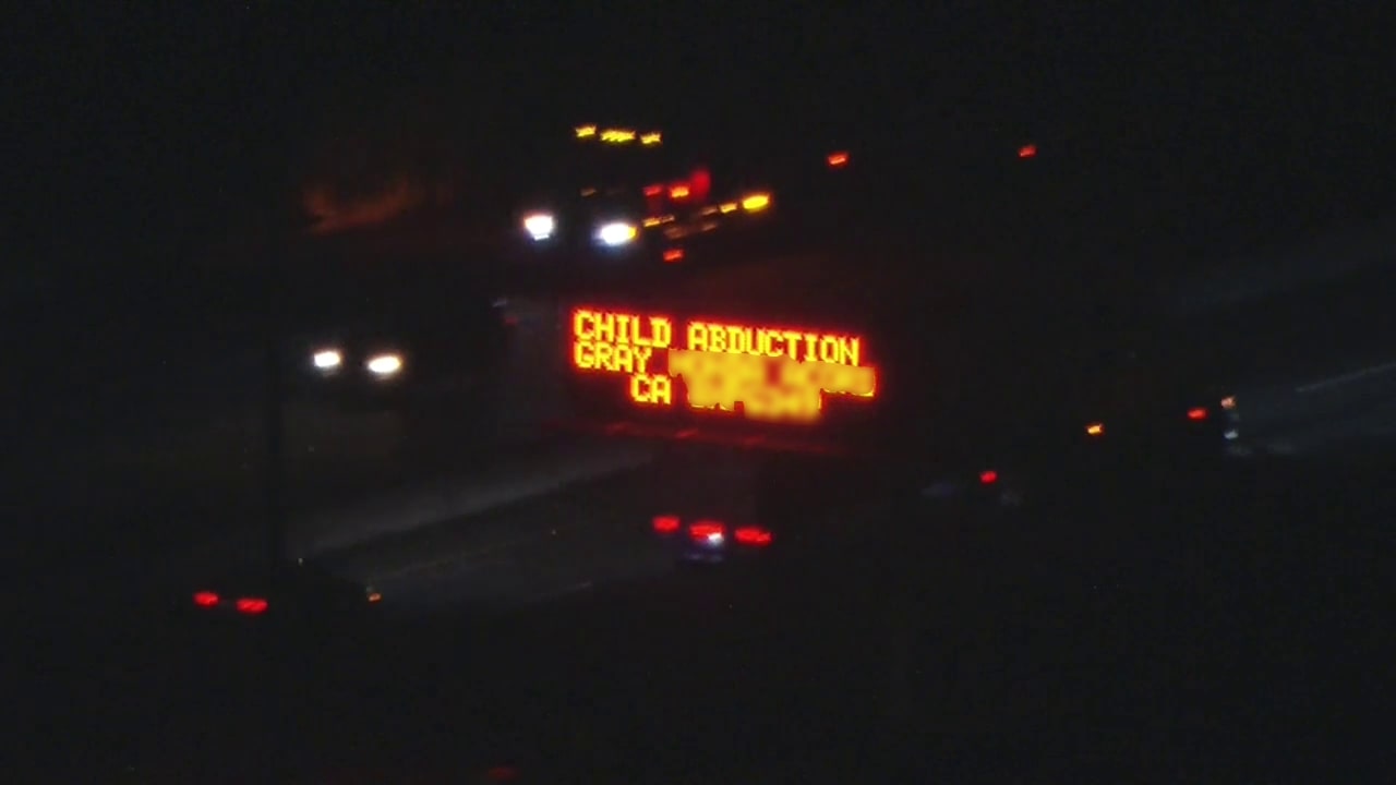 Child abducted after being left in car