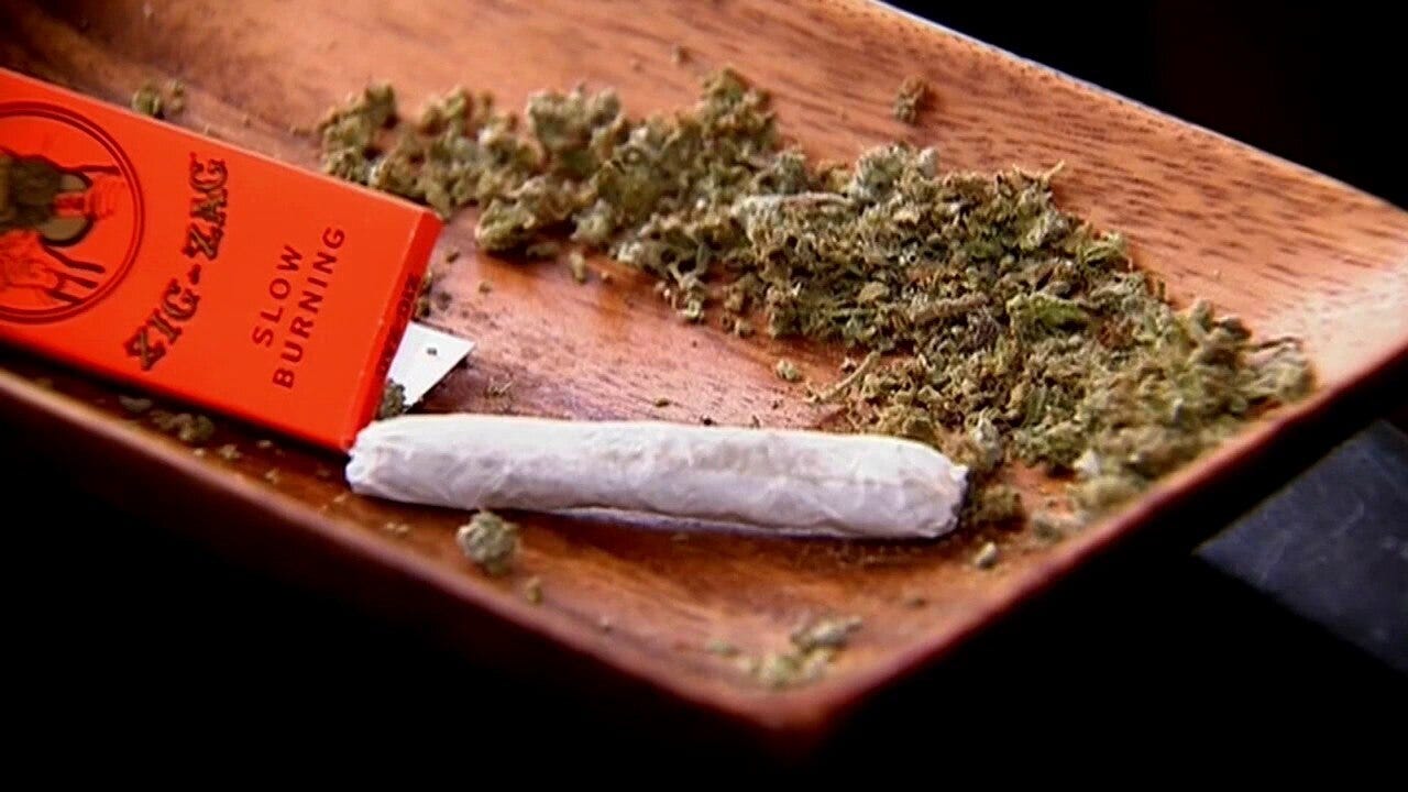 Activists, business owners react to marijuana reclassification