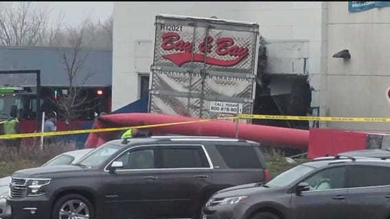 Semi truck crashes in dentist's office