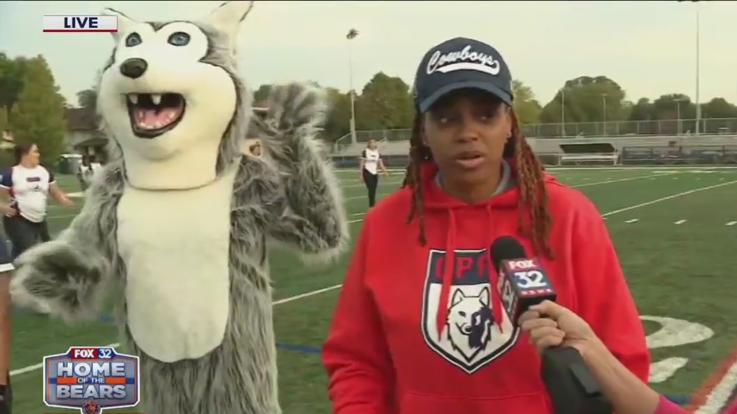 Oak Park and River Forest High School celebrate Orange Friday with flag and varsity football